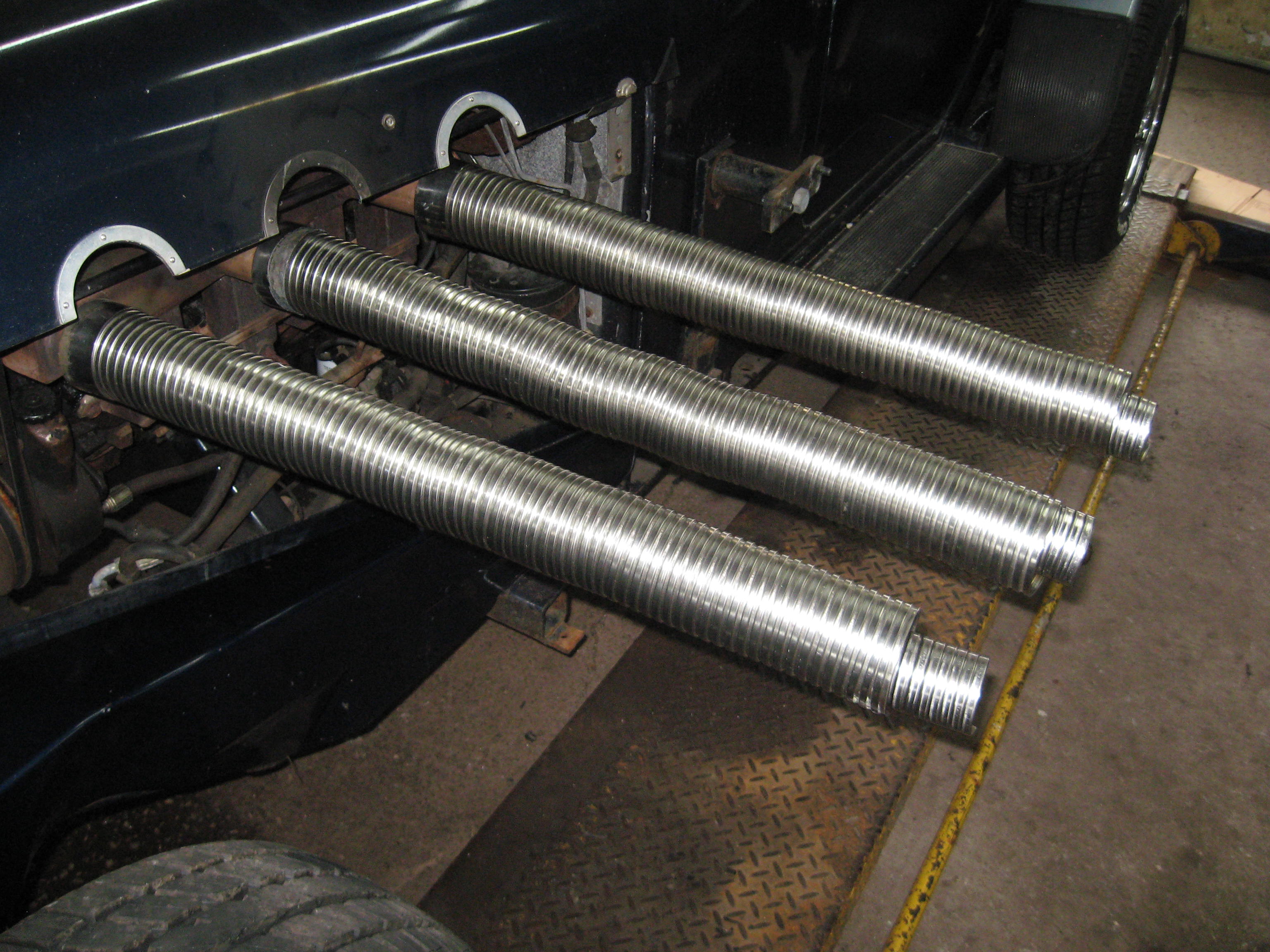 Automotive Exhaust Specialists work